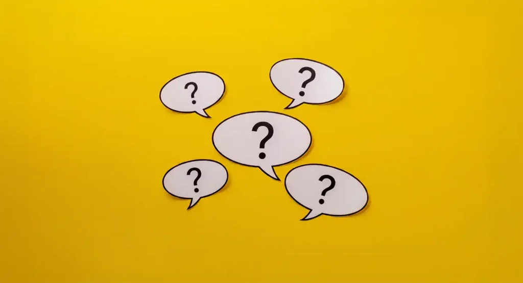 Speech bubbles with question marks on a yellow background, representing five questions you should ask.
